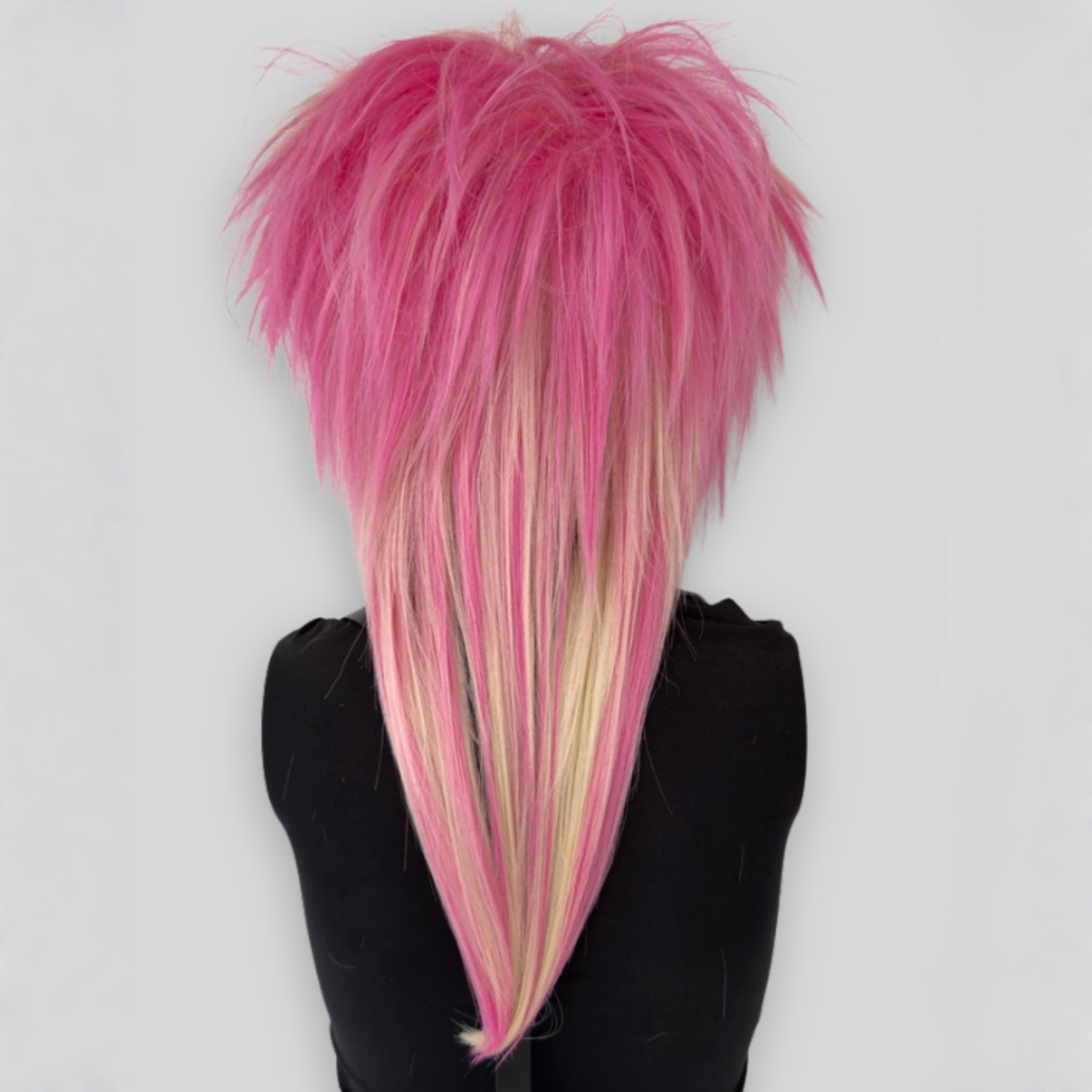 Back view of platinum blonde and pastel pink layered wig, showcasing smooth texture and professional styling. Ideal for kawaii, y2k, scenecore, cosplay, pastel goth, and alternative fashion lovers.
