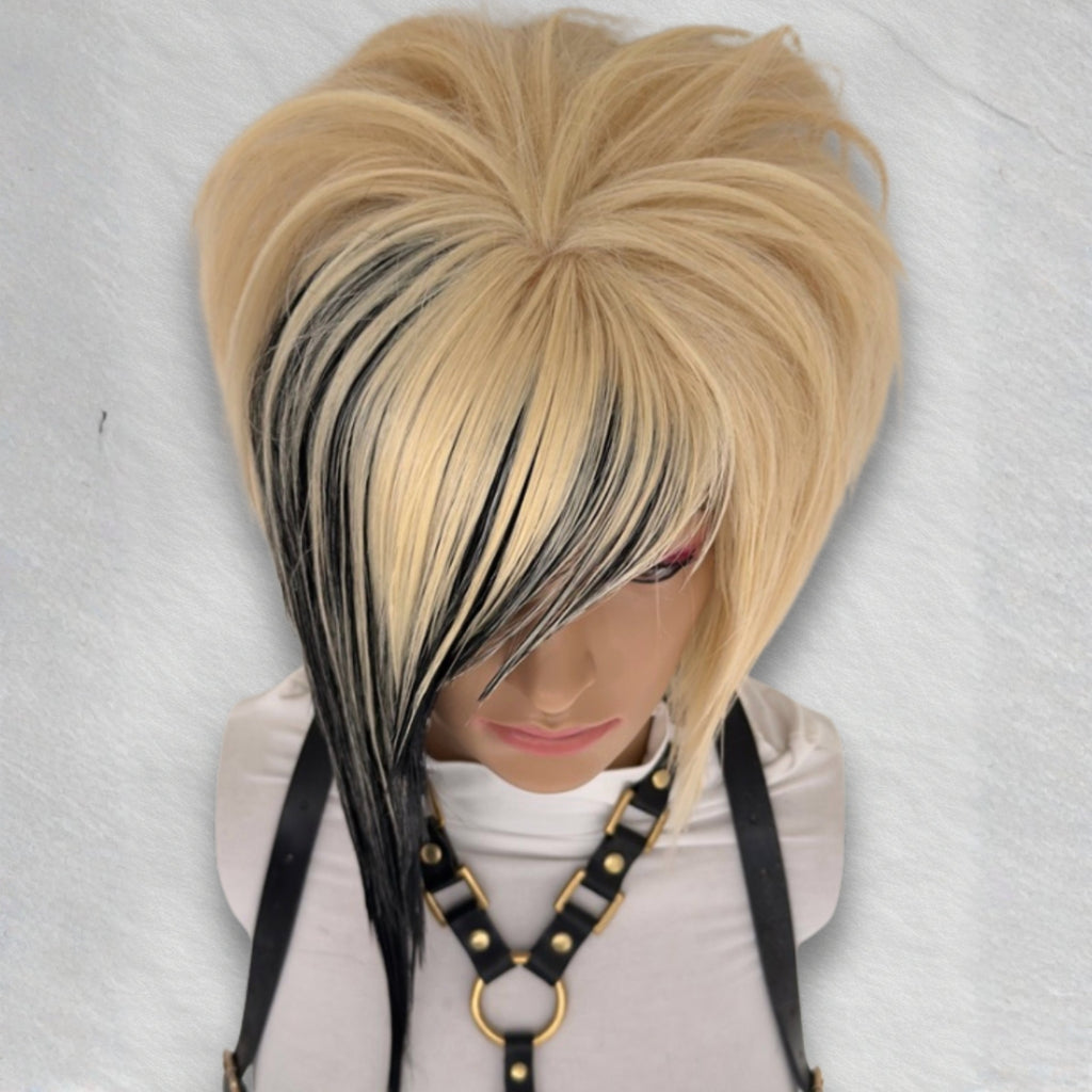 Close-up of side-swept bangs on short emo scene wig with blonde and black streaks, asymmetrical bob cut and natural silk top, alternative cosplay wig for visual kei and y2k fashion.