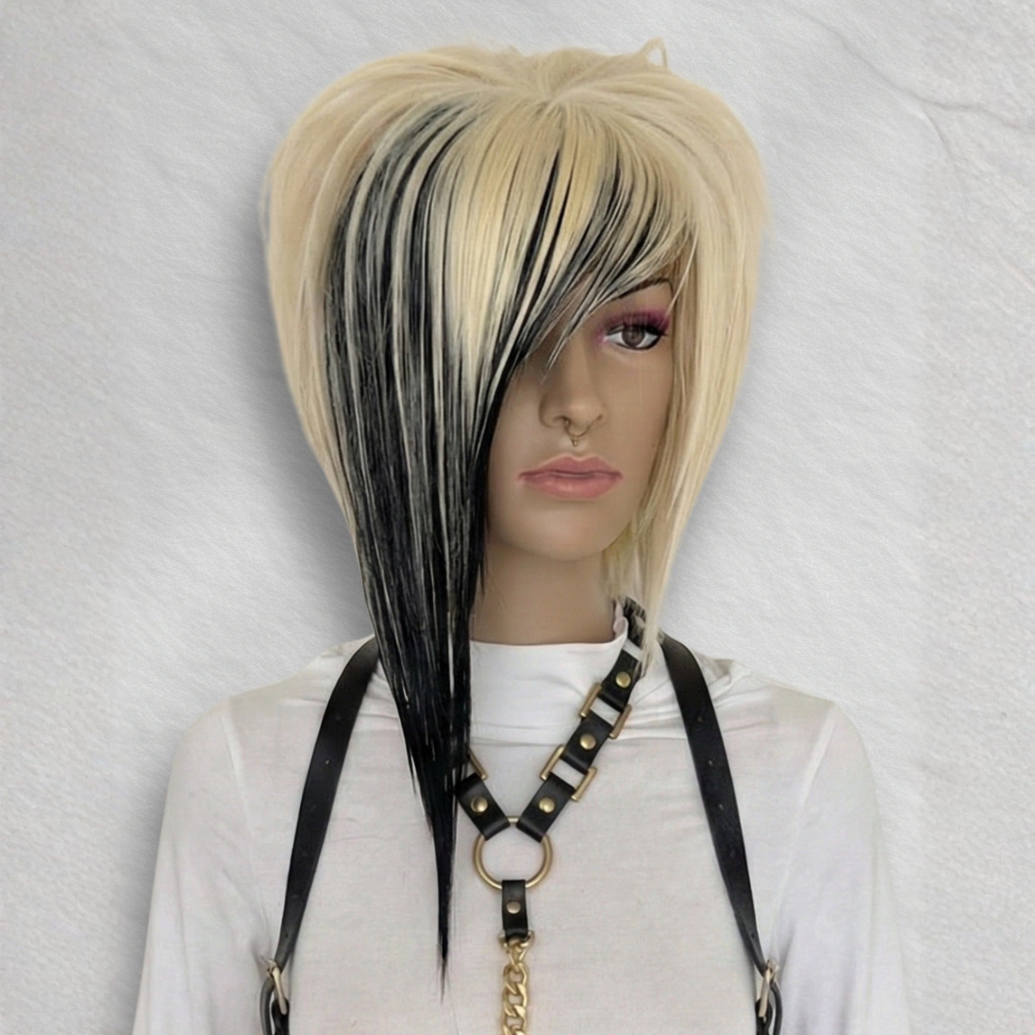 Front angle of blonde and black scene wig with short layered bob cut and side bangs, heat-resistant synthetic wig with silk top for alternative hair, anime cosplay, punk scene style and everyday wear.