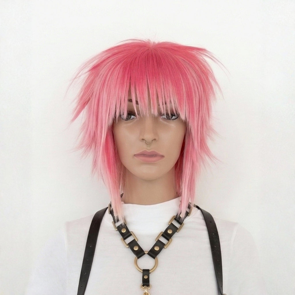 Short pink scene wig with spiky layered cut and straight choppy bangs front view